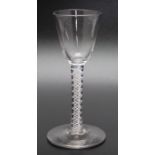 An 18th century opaque twist glass, circa 1765