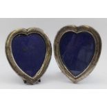 Synyer & Beddoes, A pair of late Victorian heart shape silver mounted photograph frames