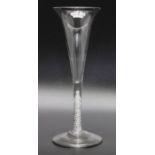 An 18th century opaque twist drawn trumpet bowl glass circa 1760