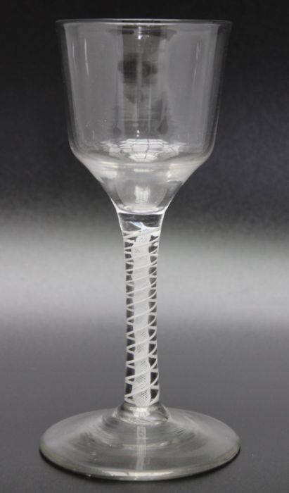 An 18th century large opaque twist glass, circa 1765