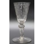 An 18th century Silesian stem wine glass, bowl cut with stylised flowers stem