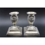 Hamilton & Inches, a pair of Edwardian silver candlesticks