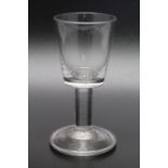 An 18th century plain stem glass, square bucket bowl circa 1740