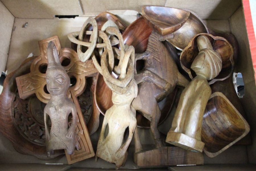 A box of carved wooden items