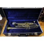 A Boosey & Hawkes 400 Trumpet with mouthpiece, in hard shell case