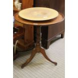 A 19th century saucer topped tripod table