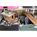 Two boxes containing domestic collectables to include model Gypsy caravan, African figurines, etc