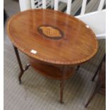 An Edwardian oval mahogany table, shell paterna to top