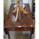 A 19th century mahogany Pembroke table with twin opposing cutlery drawers