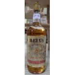 A 1 litre bottle of Bells Extra Special Whisky