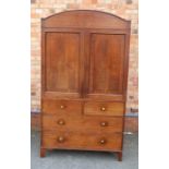 A mahogany linen press with two short over two long drawers