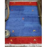 A modern hand knotted Indian woollen carpet