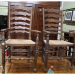 A set of six modern rush seated ladderback chairs, four singles, two carvers