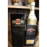 A boxed bottle of Martini Gold