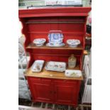 A red painted pine dresser