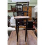 A late 19th century child's correction chair, turned frame back, split cane seat, possibly Thonnet