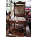 Six 'Old Charm' dining chairs, with upholstered back and seat pads, four singles, two carvers