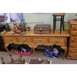 A large modern pine four drawer dresser