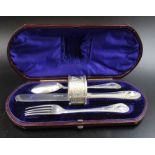 A matched silver Christening set, in a silk & velvet lined case