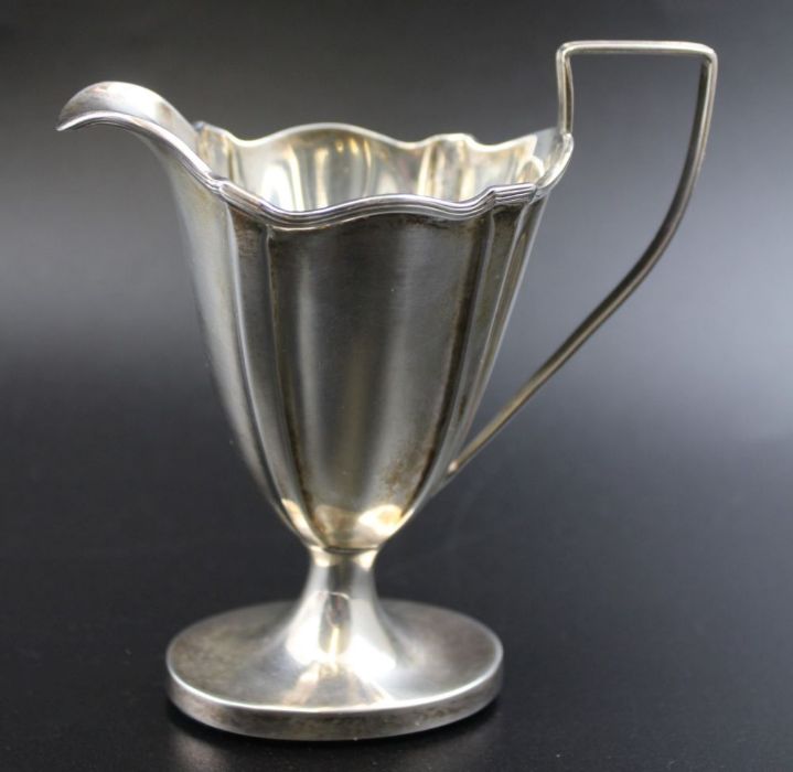 Thomas Bradbury & Sons, a late 19th century silver cream jug of tapering fluted form, weighted oval - Image 6 of 8