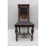 A late 19th century Italian oak framed single chair, embossed studded seat & back