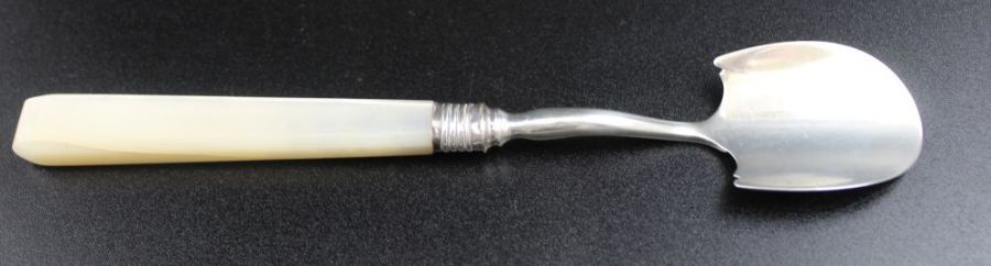 Samuel Pemberton, A George III silver cheese scoop, fitted canted mother-of-pearl handle, Birmingham