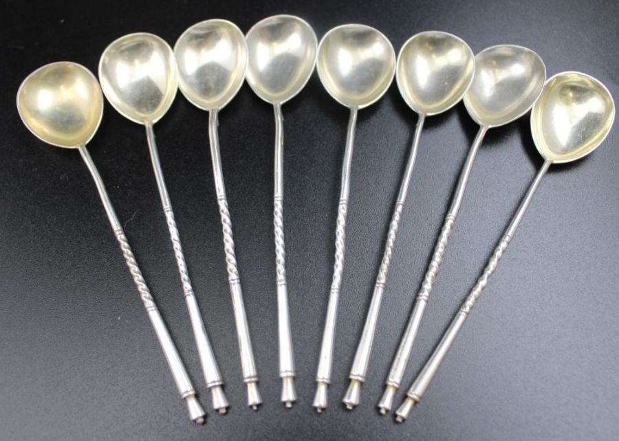 A set of eight Russian silver tea stirrers, engraved bowls with monogram "C" 84 mark combined weight