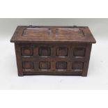 A small 18th century Dutch oak box of coffer form with multi panelled front,