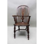 A 19th century provincial hoop stick & pierced splat back, open armchair, yew wood with an elm seat,