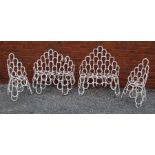 A suite of garden furniture constructed from welded horseshoes,