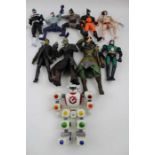 A collection of ten fantasy figures, to include; Batman, Wolverine, Power Rangers, etc.