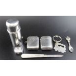 A silver shaving container with original bar of soap, two silver vesta cases, a silver pill box, sil