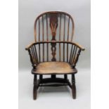 A 19th century stick and splat back armchair