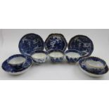 A collection of five various 18th century blue & white porcelain tea bowls and saucers, includes Cau