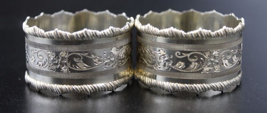 A pair of silver floral engraved napkin rings, Sheffield 1905 combined weight 55g - Image 5 of 6
