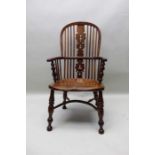 A 19th century provincial hoop stick & pierced splat back, open armchair, yew wood with an elm seat,