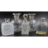 William Neale, a pair of early 20th century silver lidded facet cut globular scent bottles,