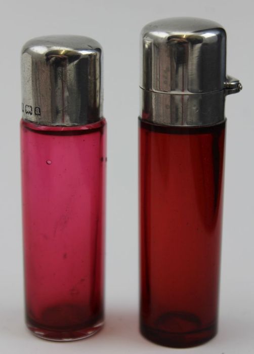 Two Victorian ruby scent bottles with silver mounts, Birmingham1898-1900 tallest 7cm