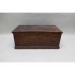 A 19th century elm coffer, the hinged lid revealing a candle box, 82cm wide