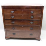 A Georgian mahogany secretaire, having two concealed upper drawers