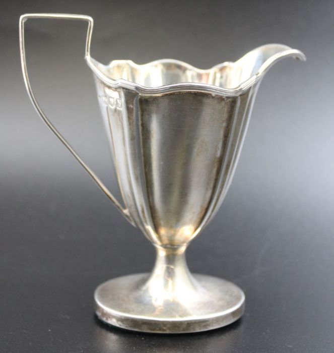 Thomas Bradbury & Sons, a late 19th century silver cream jug of tapering fluted form, weighted oval - Image 5 of 8