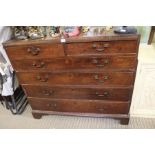 A late 18th century oak six drawer chest, retaining period swan neck handles