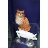 A Beswick cat, together with a Prize Pig