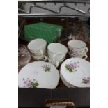 A box of assorted glass & china