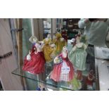 Four Royal Doulton ladies