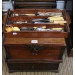 An oak canteen, together with plated cutlery together with a metal bound mahogany