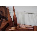 A selection of turned wooden exercise accessories