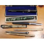 A quantity of pens & propelling pencils