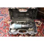 Black boxed angle grinder with heads