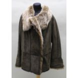 Two fur trimmed coats bearing the brand name Louis Feraud